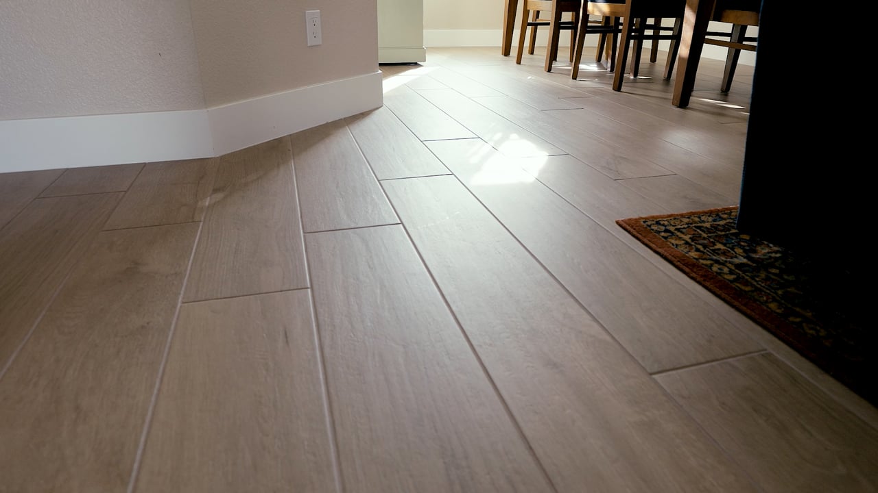Next Day Floors USA crew installing luxury vinyl flooring